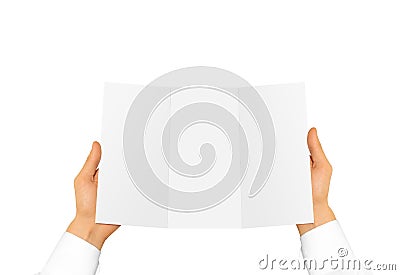 Hand in white shirt sleeve holding blank offset paper in the han Stock Photo