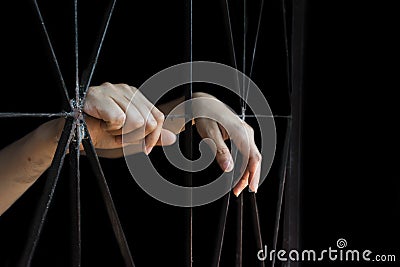 Hand of woman holding cage, abuse, human trafficking concept Stock Photo