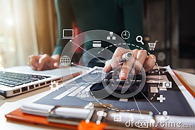 Women doing finances and calculate on desk about cost at home office. Stock Photo