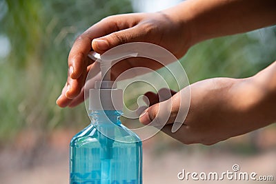 Hand women using alcohol gel Stock Photo