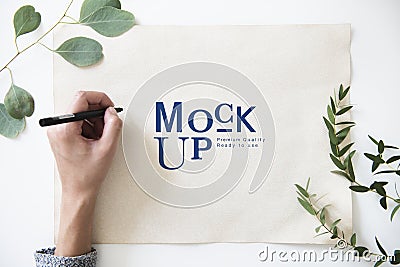 Hand working on paper mockup Stock Photo