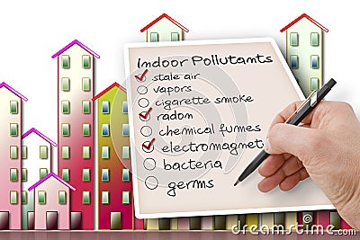 Hand write a check list of indoor air pollutants against a buildings background Stock Photo