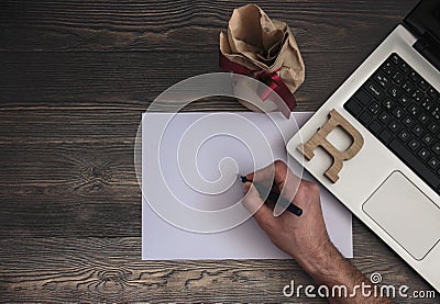 Hand Writes In Notebook On Laptop Stock Photo Stock Photo