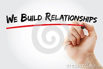 Hand writing We Build Relationships with marker, concept background Stock Photo