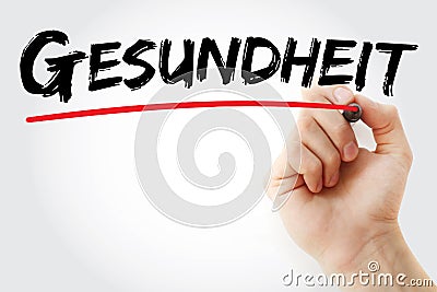 Hand writing Gesundheit Health in German with marker, health concept background Stock Photo