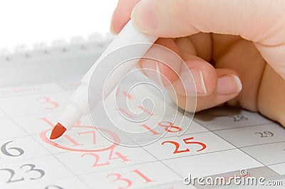 Hand writing important date Stock Photo