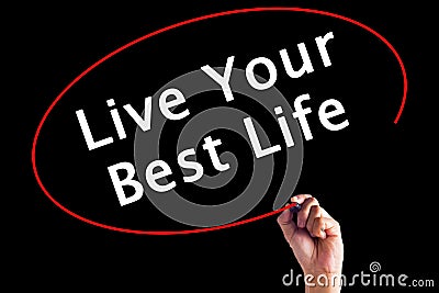 Hand Writing Live Your Best Life with a marker Stock Photo