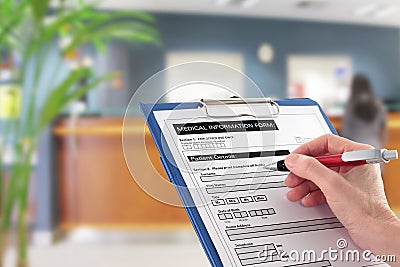 Hand Writing on Medical Details Form in Hospital Stock Photo