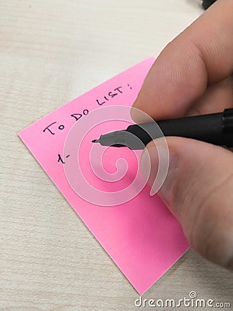 Hand writing with pen to do list Stock Photo