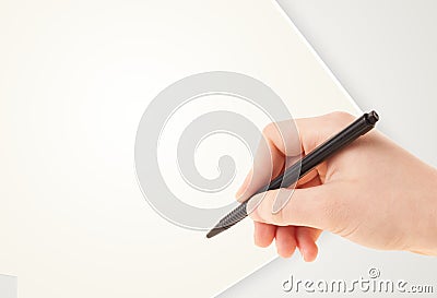 Hand writing on plain empty white paper copy space Stock Photo