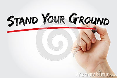 Hand writing Stand Your Ground with marker, concept background Stock Photo