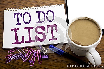 Hand writing text caption inspiration showing To Do List. Business concept for Plan Lists Remider written on note paper on the woo Stock Photo