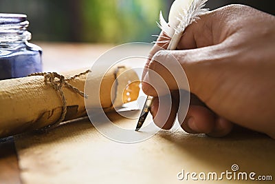 Hand writing using quill pen Stock Photo