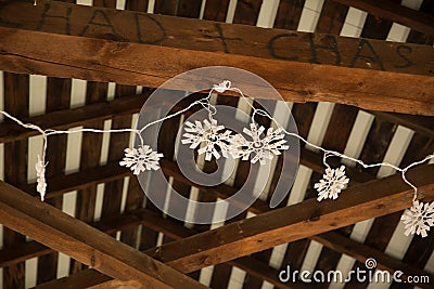 Hand Written Couple Names on Wood Beams with Fairy Lights Stock Photo