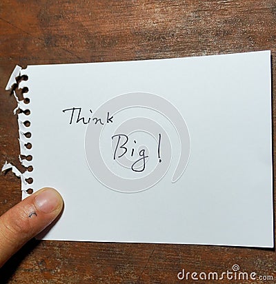 Hand written motivational word Think big Stock Photo