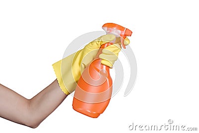 Hand in yellow protective glove spraying cleaning liquid Stock Photo