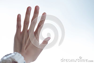 hand of young woman wearing white watch have white are background. this image for people,body part and background concept Stock Photo