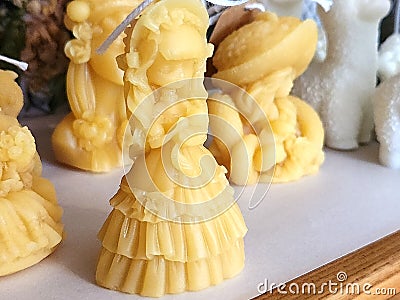 Handcrafted beeswax candles. Hand-poured pure natural beeswax candles. Stock Photo