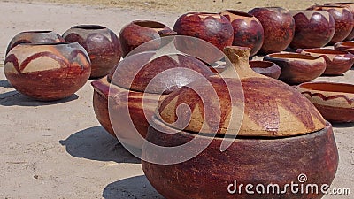 Handcrafted brown clay pots used for storage of dry produce. Location: Namibia Stock Photo