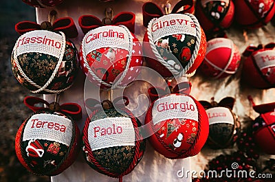 Handcrafted christmas ball with common italian names on them Stock Photo