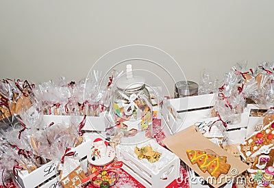Handcrafted Christmas gingerbread house on red velvet Stock Photo
