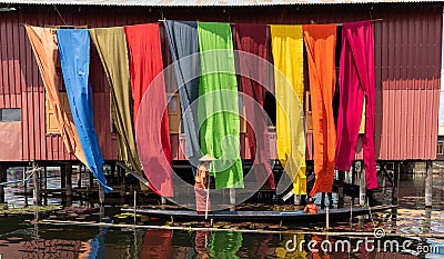 Handcrafted colorful lotus fabrics made from lotus fibers in Inle Lake, Shan State in Myanmar. Stock Photo