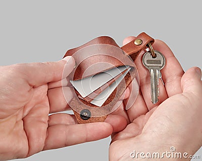 Handcrafted leather keychain with family photos for daddy Stock Photo