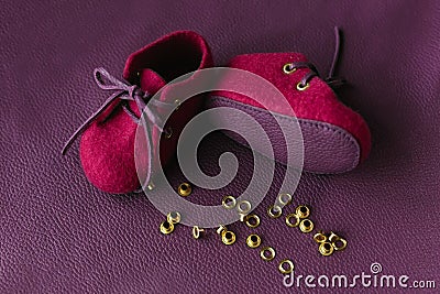 Handcrafted merino wool baby shoes Stock Photo