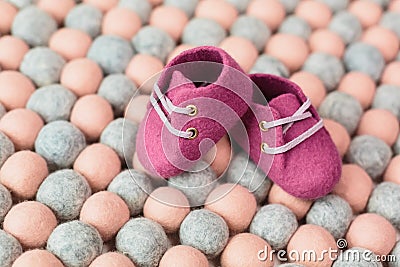 Handcrafted merino wool baby shoes Stock Photo