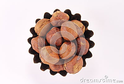 Handful hazelnuts in figured form Stock Photo