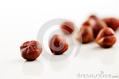 A handful of hazelnuts on a white background Stock Photo