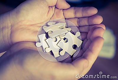 Handful of jigsaws for business concept Stock Photo