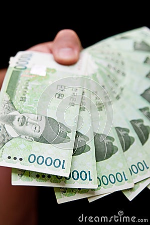 Handful of Korean Won Stock Photo