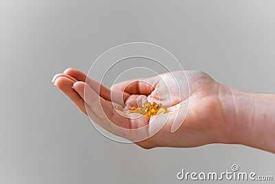 Handful with omega pills, healthy fats, vitamin E Stock Photo