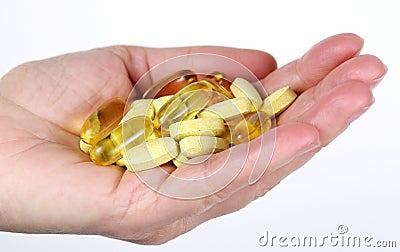 Handful of vitamins Stock Photo