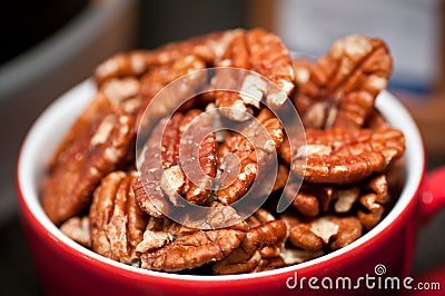 Handful of walnuts in a cup Stock Photo