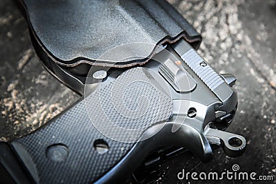Handgun in holster Stock Photo