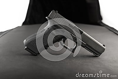 Handgun side view with artificial lighting Stock Photo