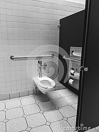 Handicap accessible bathroom stall with toilet Stock Photo