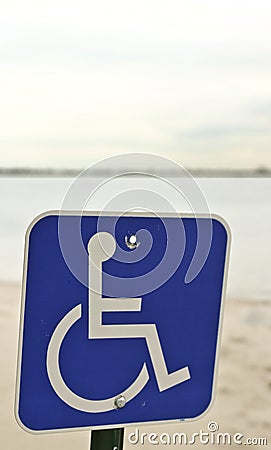 Handicap sign on a beach Stock Photo