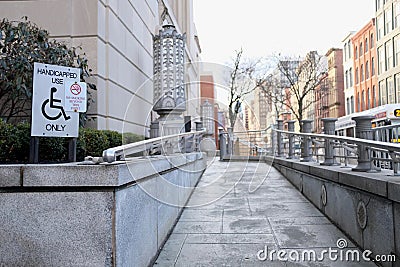 Handicapped Accessible Ramp in Urban Setting Stock Photo