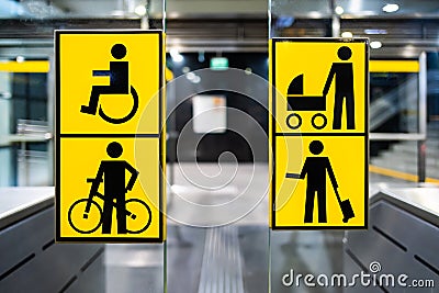 Handicapped, bicycle, stroller and big luggage yellow pictrogram in metro, information in public transport, no people Stock Photo