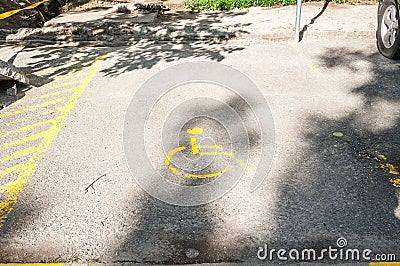 Handicapped disabled icon sign on parking lot or space area in car park in the city street Stock Photo