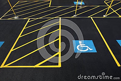 A new parking lot with stalls reserved for handicapped parking Stock Photo