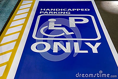 Handicapped parking only sign slot for disable people. Stock Photo