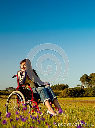 Handicapped woman on wheelchair Stock Photo