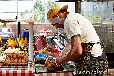 Young Colombian chef preparing a typical dish Editorial Stock Photo