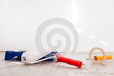 Handiwork painter, material for paint a white wall Stock Photo