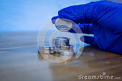 Handling coins Stock Photo