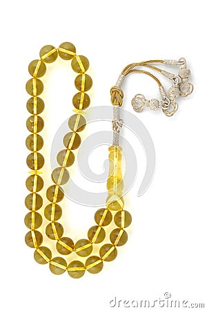Handmade Baltic amber rosary beads isolated on white Stock Photo